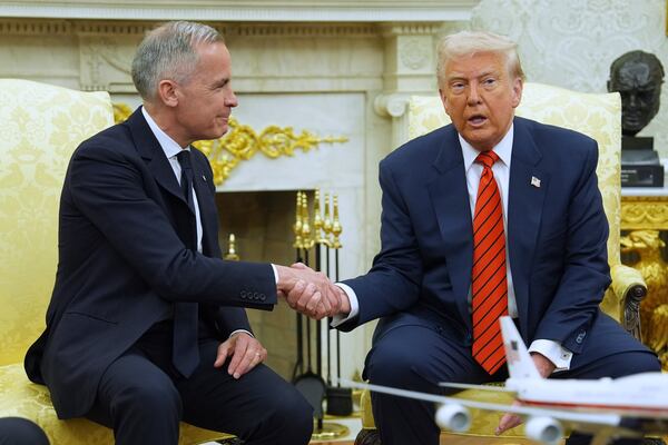 President Donald Trump meets Canadian Prime Minister Mark Carney in the Oval Office of the White House, Tuesday, May 6, 2025, in Washington. (AP Photo/Evan Vucci)