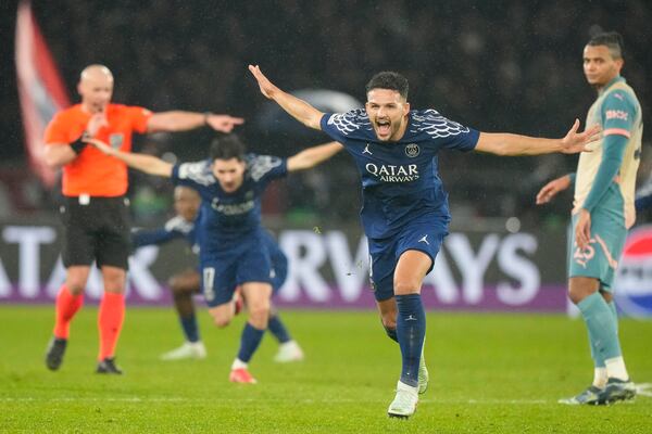 PSG's Goncalo Ramos celebrates after scoring his side's fourth goal during the Champions League opening phase soccer match between Paris Saint-Germain and Manchester City at the Parc des Princes in Paris, Wednesday, Jan. 22, 2025. (AP Photo/Michel Euler)