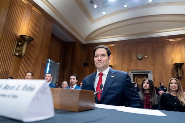 Sen. Marco Rubio, R-Fla., President-elect Donald Trump's choice to be Secretary of State, takes his seat before the Senate Foreign Relations Committee for his confirmation hearing, at the Capitol in Washington, Wednesday, Jan. 15, 2025. (AP Photo/Alex Brandon)