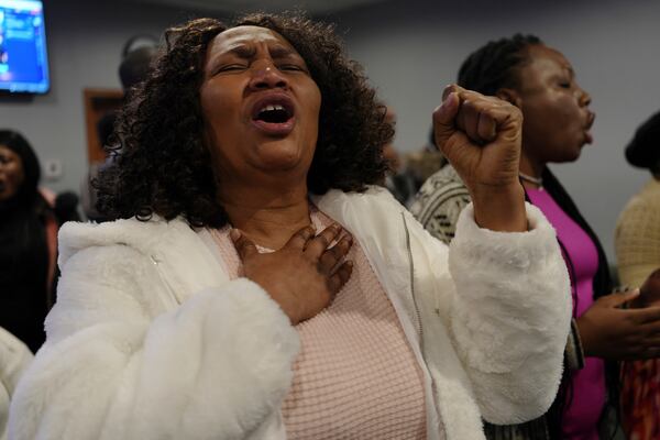 Congregants worship at the First Haitian Evangelical Church of Springfield, Sunday, January 26, 2025, in Springfield, Ohio. (AP Photo/Luis Andres Henao)