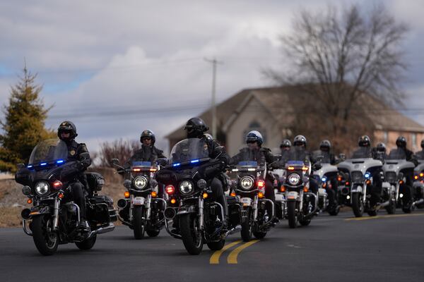 The remains of West York Borough Police Officer Andrew Duarte, arrive for his funeral at Living Word Community Church, in Red Lion, Pa., Friday, Feb. 28, 2025. (AP Photo/Matt Rourke)