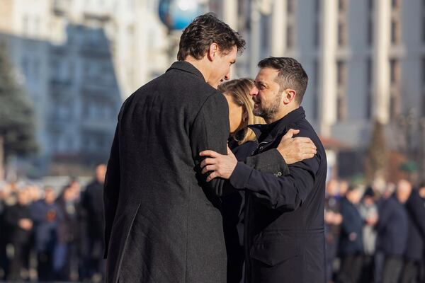 In this photo provided by the Ukrainian Presidential Press Office, Office shows Ukraine's President Volodymyr Zelensky, right, greeting Canada's Prime Minister Justin Trudeau during a ceremony in Kyiv, Ukraine, Monday, Feb. 24, 2025. (Ukrainian Presidential Press Office via AP)