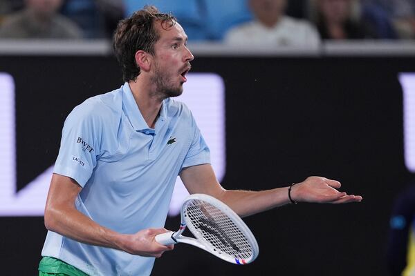 Daniil Medvedev of Russia reacts during his second round match against Learner Tien of the U.S. at the Australian Open tennis championship in Melbourne, Australia, Thursday, Jan. 16, 2025. (AP Photo/Ng Han Guan)