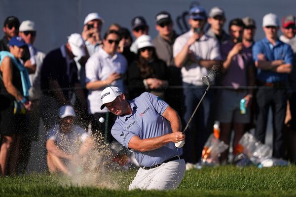 Sepp Straka, of Austria, hits on the 18th hole during the third round of the Truist Championship golf tournament at the Philadelphia Cricket Club, Saturday, May 10, 2025, in Flourtown. (AP Photo/Matt Rourke)