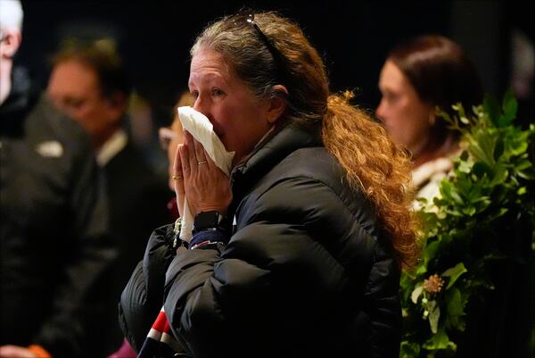 Mourners view the casket of former President Jimmy Carter as he lies in repose at the Carter Presidential Center in Atlanta, Saturday, Jan. 4, 2025. Carter died Dec. 29th at the age of 100. (AP Photo/Alex Brandon, Pool)