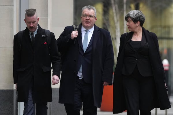 British lawmaker Tom Watson, center, arrives at the High Court, as Prince Harry's legal action against News Group Newspapers over allegations of unlawful information gathering begins, in London, Wednesday, Jan. 22, 2025. (AP Photo/Alastair Grant)