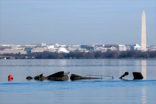 In this image provided by the U.S. Coast Guard, wreckage is seen in the Potomac River near Ronald Reagan Washington National Airport, Thursday, Jan. 30, 2025, in Washington. (Petty Officer 1st Class Brandon Giles/U.S. Coast Guard via AP)