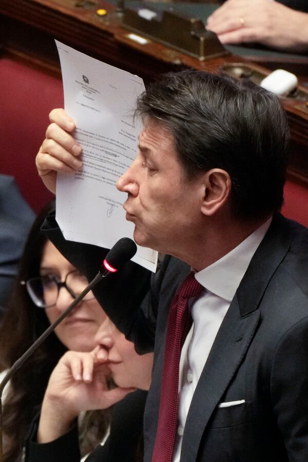 5-Star Movement leader Giuseppe Conte speaks during a debate in the Italian lower Chamber in Rome, Wednesday, Feb. 5, 2025, over the controversial repatriation, last week, of a Libyan warlord, Ossama Anjiem, also known as Ossama al-Masri, wanted by the International Criminal Court in the Hague, and who had been arrested in Turin, northern Italy. (AP Photo/Gregorio Borgia)