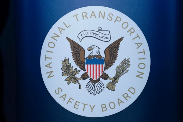 FILE - The seal of the National Transportation Safety Board is seen before a news conference at Ronald Reagan Washington National Airport, Jan. 31, 2025, in Arlington, Va. (AP Photo/Jose Luis Magana, File)