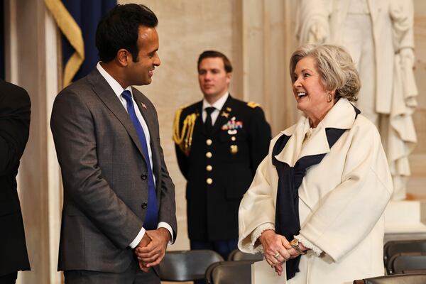 Vivek Ramaswamy, left, speaks with President-elect Donald Trump's Chief of Staff Susie Wiles before the 60th Presidential Inauguration in the Rotunda of the U.S. Capitol in Washington, Monday, Jan. 20, 2025. (Chip Somodevilla/Pool Photo via AP)