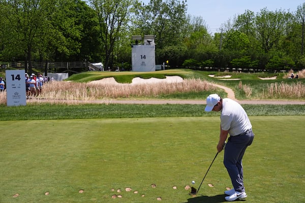 Robert MacIntyre, of Scotland, hits on the 14th hole during the final round of the Truist Championship golf tournament at the Philadelphia Cricket Club, Sunday, May 11, 2025, in Flourtown. (AP Photo/Matt Rourke)