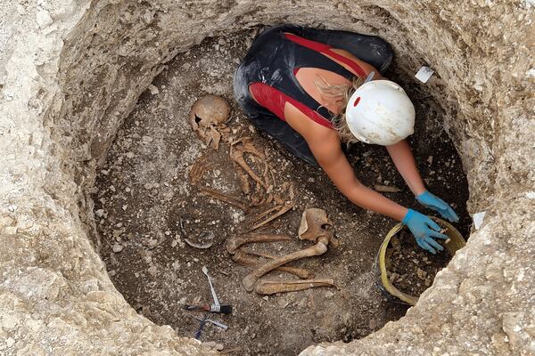 This photo provided by Bournemouth University in January 2025 shows burials being investigated at an Iron Age Celtic cemetery as part of the Durotriges tribe project dig in Dorset, southwest England. (Bournemouth University via AP)