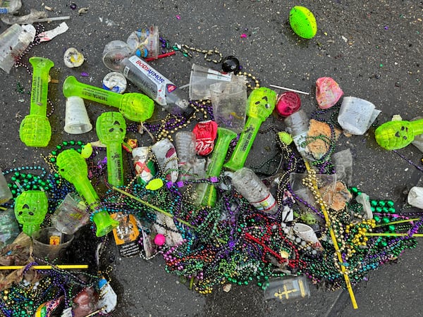 Detritus from Mardi Gras Day in New Orleans, lies scattered in the French Quarter on Ash Wednesday, March 5, 2025. (AP Photo/Jack Brook)