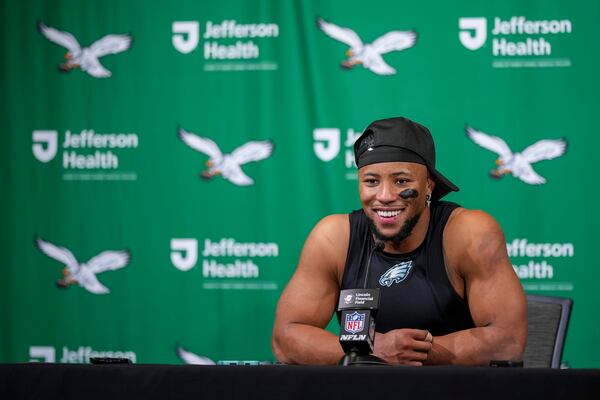 Philadelphia Eagles running back Saquon Barkley speaks to reporters following an NFL football game against the Dallas Cowboys, Sunday, Dec. 29, 2024, in Philadelphia. The Eagles won 41-7. (AP Photo/Matt Slocum)