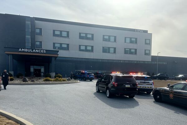 FILE - Law enforcement arrive at the scene of a shooting at UPMC Memorial Hospital in York, Pa., Feb. 22, 2025. (AP Photo/Mark Scolforo, File)