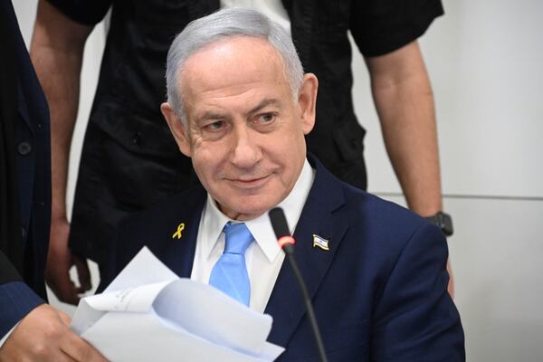 Israel's Prime Minister Benjamin Netanyahu, front, attends his trial on corruption charges at the district court in Tel Aviv, Israel, Wednesday, March 12, 2025. (Yair Sagi/Pool Photo via AP)