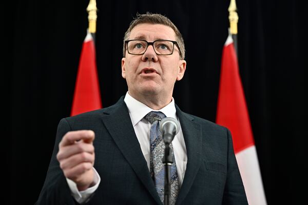 Saskatchewan Premier Scott Moe speaks as he arrives for a first ministers meeting in Ottawa on Wednesday, Jan. 15, 2025. (Justin Tang/The Canadian Press via AP)