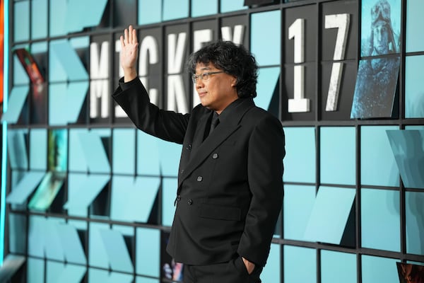 Director Bong Joon-Ho poses for photographers upon arrival at the World premiere for the film 'Mickey 17' on Thursday, Feb. 13, 2025, in London. (Photo by Scott A Garfitt/Invision/AP)