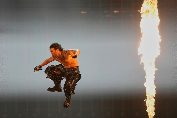 PARG from Armenia performs the song "SURVIVOR" during the dress rehearsal for the Grand Final of the 69th Eurovision Song Contest, in Basel, Switzerland, Friday, May 16 2025. (AP Photo/Martin Meissner)
