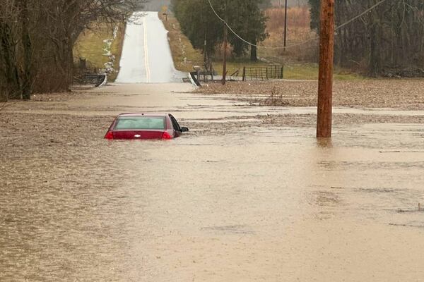 This photo provided by the Warren County, Ky., Sheriff's Office shows a partially submerged car outside of Bowling Green, Ky., on Saturday, Feb. 15, 2025. (Warren County Sheriff's Office via AP)