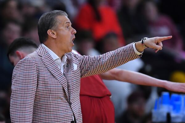 Arkansas head coach John Calipari calls to his players during the first half in the second round of the NCAA college basketball tournament, Saturday, March 22, 2025, in Providence, R.I. (AP Photo/Steven Senne)