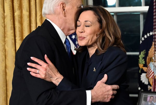 President Joe Biden hugs Vice President Kamala Harris after giving his farewell address from the Oval Office of the White House Wednesday, Jan. 15, 2025, in Washington. (Mandel Ngan/Pool via AP)