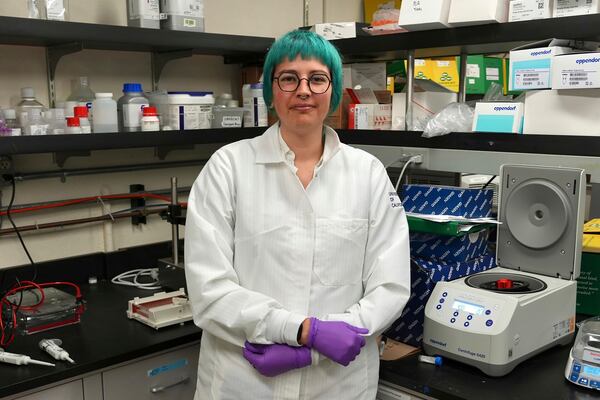 Kendra Dahmer, a postdoctoral researcher studying infectious disease, is pictured in a laboratory at the University of California, Berkeley, in Berkeley, Calif., Monday, Feb. 3, 2025. (AP Photo/Terry Chea)