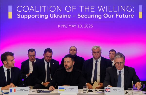 France's President Emmanuel Macron, left, Ukrainian President Volodymyr Zelenskyy and British Prime Minister Keir Starmer, right, sit during a summit at the Mariinskyi Palace, in Kyiv, Ukraine, Saturday, May 10, 2025. (Ludovic Marin, Pool Photo via AP)