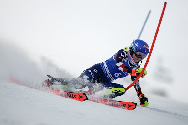 United States' Mikaela Shiffrin speeds down the course during a women's World Cup slalom, in Courchevel, France, Thursday Jan. 30, 2025. (AP Photo/Gabriele Facciotti)