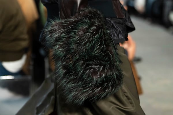 A model wears a creation as part of the Sacai Fall/Winter 2025-2026 Womenswear collection presented in Paris, Monday, March 10, 2025. (Photo by Scott A Garfitt/Invision/AP)