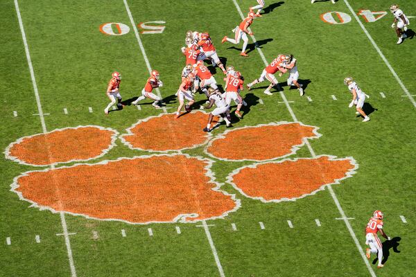 FILE - Clemson running back Phil Mafah (7) runs with the ball against Notre Dame during an NCAA college football game Saturday, Nov. 4, 2023, in Clemson, S.C. (AP Photo/Jacob Kupferman, File)