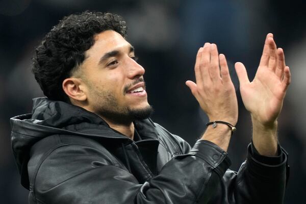 Frankfurt's Omar Marmoush greets fans after the German Bundesliga soccer match between Eintracht Frankfurt and Borussia Dortmund in Frankfurt, Germany, Friday, Jan. 17, 2025. (AP Photo/Michael Probst)