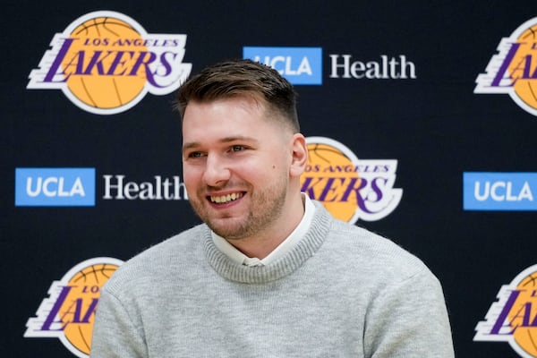 Los Angeles Lakers' Luka Doncic speaks during an introductory NBA basketball press conference Tuesday, Feb. 4, 2025, in El Segundo, Calif. (AP Photo/Jae C. Hong)