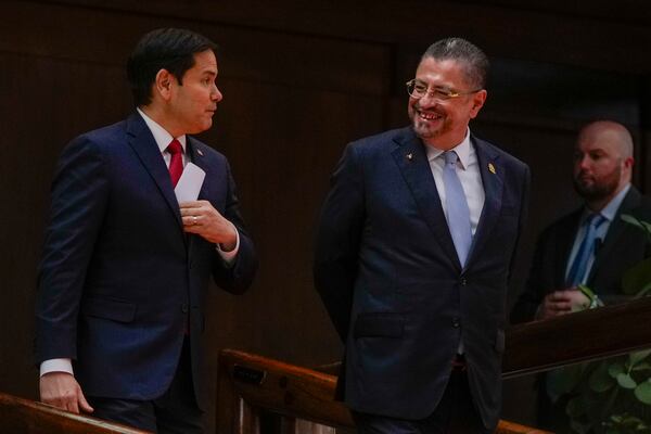 Secretary of State Marco Rubio, left, and Costa Rican President Rodrigo Chaves arrive to give a joint news conference at the presidential palace in San Jose, Costa Rica, Tuesday, Feb. 4, 2025. (AP Photo/Mark Schiefelbein, Pool)