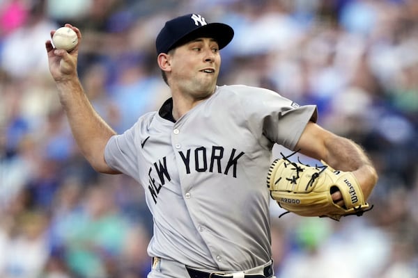 FILE - New York Yankees starting pitcher Cody Poteet throws during the first inning of a baseball game against the Kansas City Royals Wednesday, June 12, 2024, in Kansas City, Mo. (AP Photo/Charlie Riedel, File)