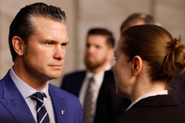 United States Secretary of Defense Pete Hegseth, left, speaks with Lithuania's Defense Minister Dovile Sakaliene during a group photo of NATO defense ministers at NATO headquarters in Brussels, Thursday, Feb. 13, 2025. (AP Photo/Geert Vanden Wijngaert)