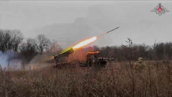 In this photo taken from video distributed by Russian Defense Ministry Press Service on Wednesday, March 19, 2025, a Russian "Grad" self-propelled multiple rocket launcher fires towards Ukrainian positions in Ukraine. (Russian Defense Ministry Press Service via AP)