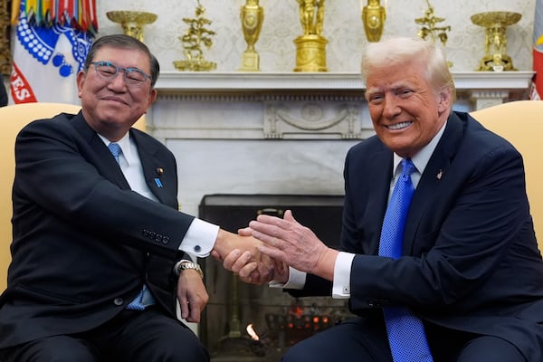 President Donald Trump meets with Japanese Prime Minister Shigeru Ishiba in the Oval Office of the White House, Friday, Feb. 7, 2025, in Washington. (AP Photo/Alex Brandon)