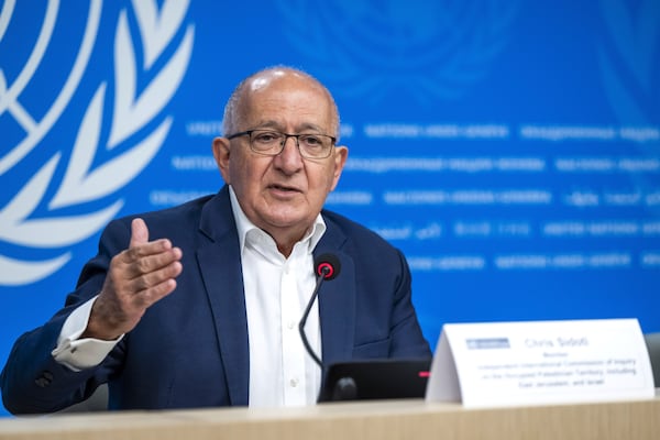 Chris Sidoti, Member of the Commission, speaks during a press conference about the launch of the latest report of the Independent International Commission of Inquiry on the Occupied Palestinian Territory, including East Jerusalem, and Israel, at the European headquarters of the United Nations, in Geneva, Switzerland, Thursday, March 13, 2025. (Martial Trezzini/Keystone via AP)