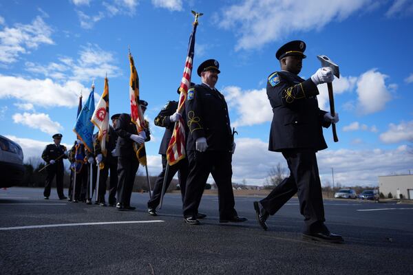 Members of the Baltimore County Fire Dept. arrives ahead of West York Borough Police Officer Andrew Duarte's funeral at Living Word Community Church, in Red Lion, Pa., Friday, Feb. 28, 2025. (AP Photo/Matt Rourke)