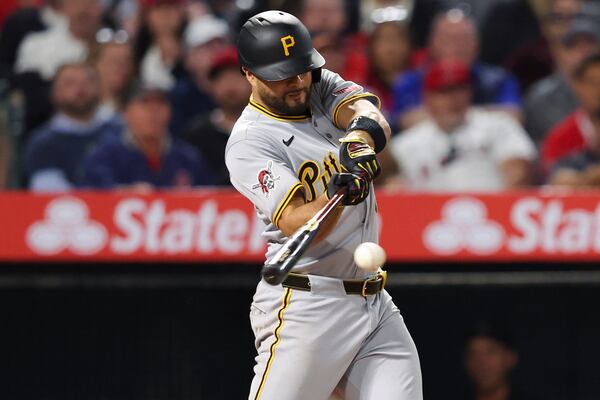 Pittsburgh Pirates' Isiah Kiner-Falefa hits an RBI single during the fifth inning of a baseball game against the Los Angeles Angels in Anaheim, Calif., Tuesday, April 22, 2025. (AP Photo/Jessie Alcheh)