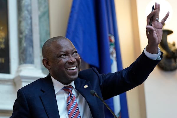 FILE - Virginia House of Delegates speaker, Del. Don Scott, D-Portsmouth, waves to family in the gallery during the opening of the 2024 session of the Virginia General Assembly at the Capitol, Jan. 10, 2024, in Richmond, Va. (AP Photo/Steve Helber, File)