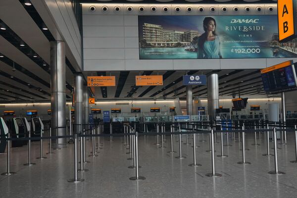 No travellers are seen inside Terminal 4 as Britain's Heathrow Airport has closed for the full day Friday after an electrical substation fire knocked out its power, disrupting flights for hundreds of thousands of passengers at one of Europe's biggest travel hubs in London, Friday, March 21, 2025.(AP Photo/Kin Cheung)