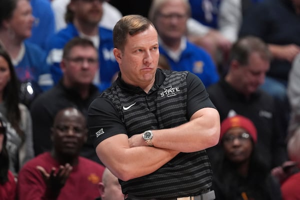 Iowa State head coach T.J. Otzelberger watches during the first half of an NCAA college basketball game against Kansas, Monday, Feb. 3, 2025, in Lawrence, Kan. (AP Photo/Charlie Riedel)