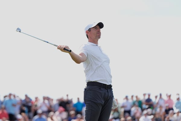 Rory McIlroy watches his tee shot on the third hole during the second round of The Players Championship golf tournament Friday, March 14, 2025, in Ponte Vedra Beach, Fla. (AP Photo/Julia Demaree Nikhinson)