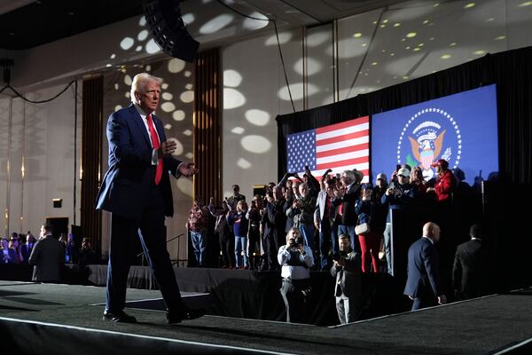 Attendees cheer as President Donald Trump departs after speaking about the economy during an event at the Circa Resort and Casino in Las Vegas, Saturday, Jan. 25, 2025. (AP Photo/Mark Schiefelbein)