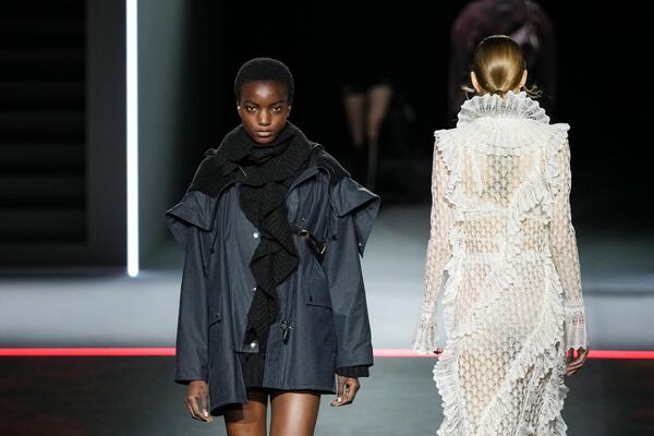 Models wears creations as part of the Dior Fall/Winter 2025-2026 Womenswear collection presented Tuesday, March 4, 2025. in Paris. (Photo by Scott A Garfitt/Invision/AP)