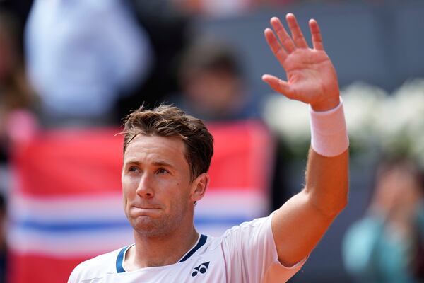 Casper Ruud of Norway celebrates after winning against Russia's Daniil Medvedev during the Madrid Open tennis tournament in Madrid, Spain, Tuesday, May 1, 2025. (AP Photo/Manu Fernandez)