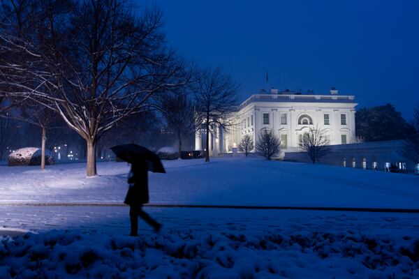 The White House is seen as the snow falls, Tuesday, Feb. 11, 2025, in Washington. (Photo/Alex Brandon)