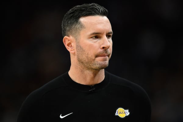 Los Angeles Lakers head coach JJ Redick looks on during the second half of an NBA basketball game against the Golden State Warriors, Wednesday, Dec. 25, 2024, in San Francisco. (AP Photo/Eakin Howard)